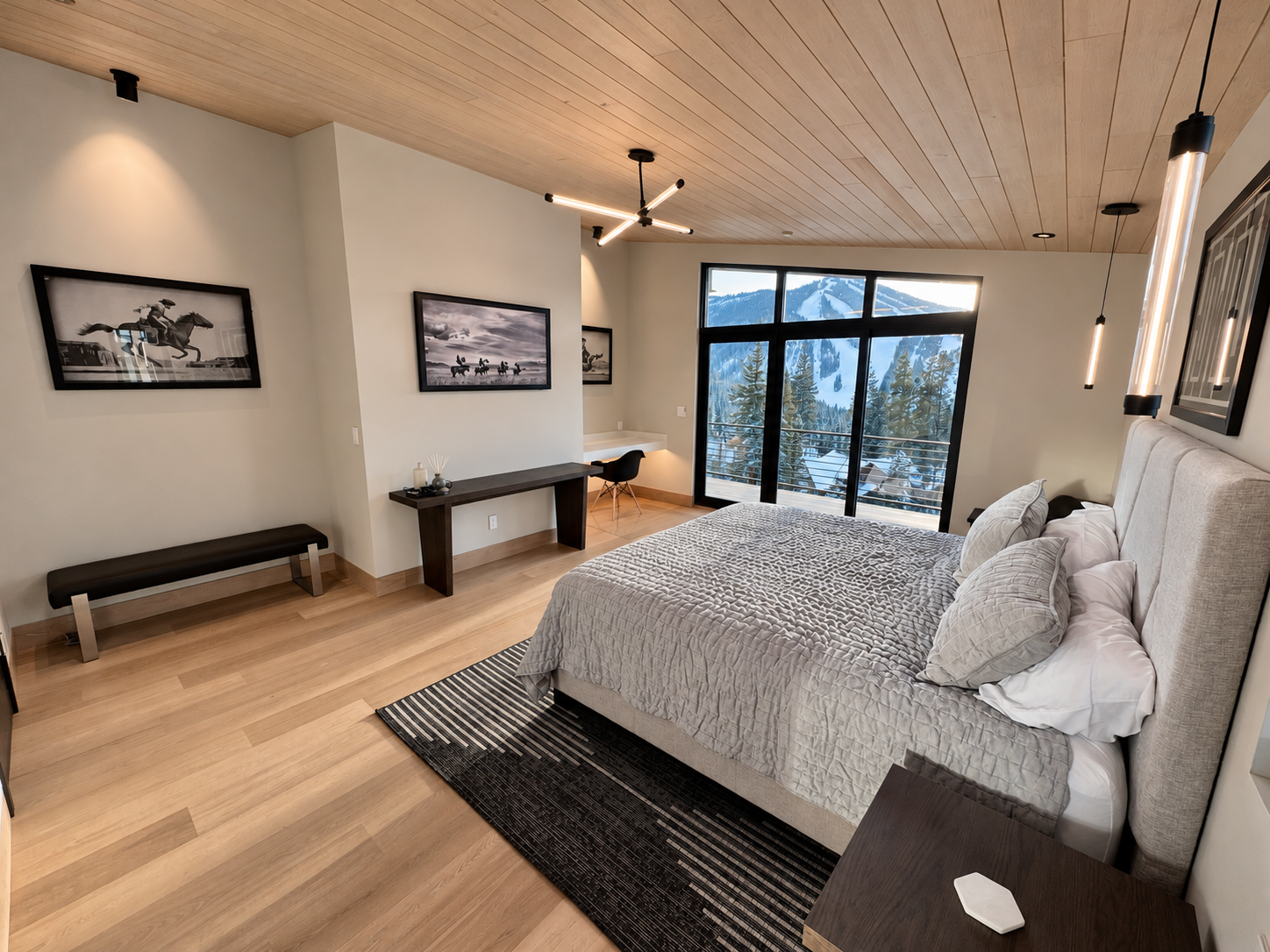 Second king bedroom with desk and mountain views.