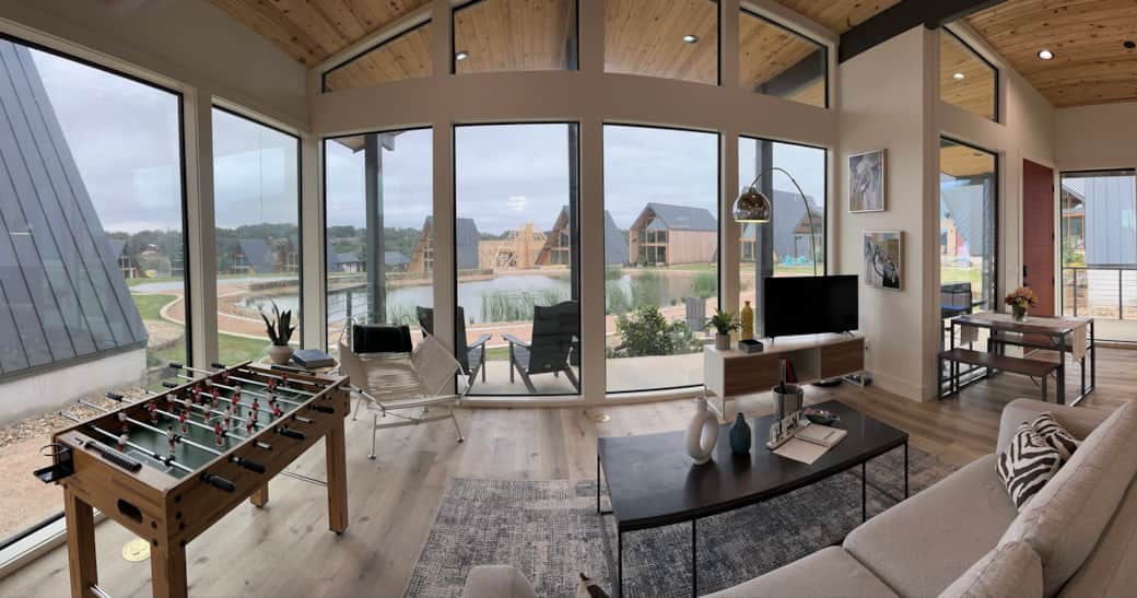 Great room with floor to ceiling windows Great room with floor to ceiling windows