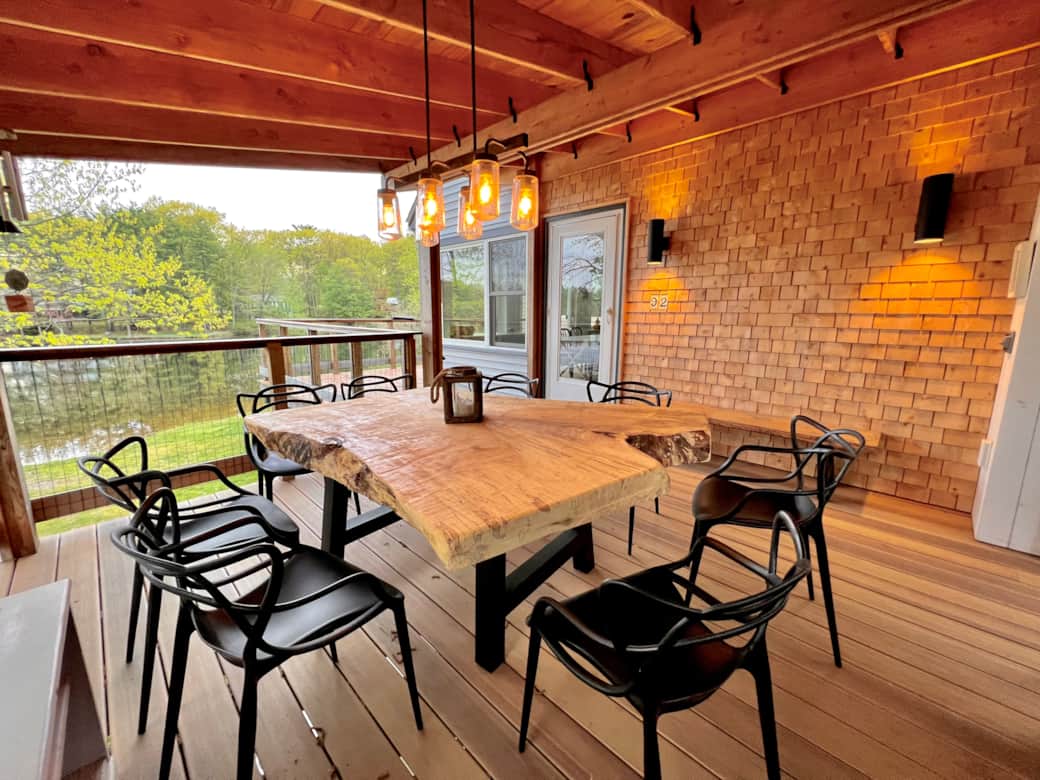 Gas grill on the porch makes cooking a beautiful experience.