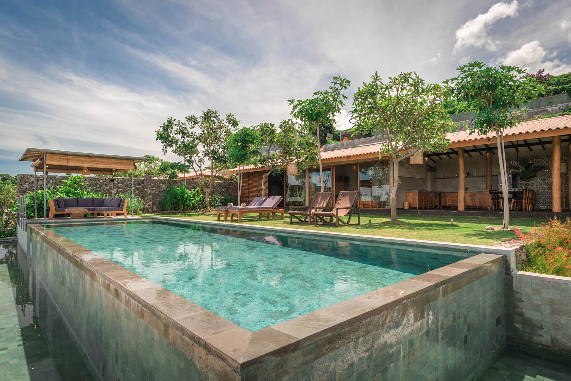 Elegant exterior view of Villa Aryaman with landscaped garden