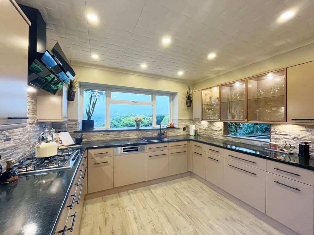 Retro-Modern Kitchen: Embrace the charm of this stylish kitchen, where retro design meets modern convenience. With ample counter space and all the essentials, it's perfect for creating memorable meals.