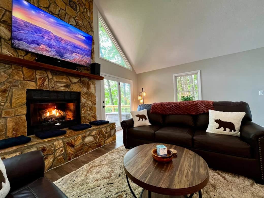 The comfy sofa, the warmth of the fire, and the conversation starters on the table are a recipe for a wonderful evening. The 70" television uses a special mount allowing you to lower it from the mantle to improve the viewing angle.