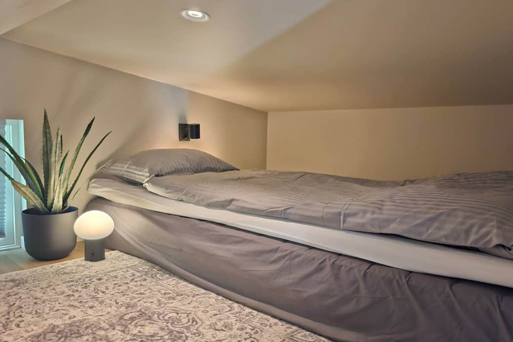 One of the beds in the loft
