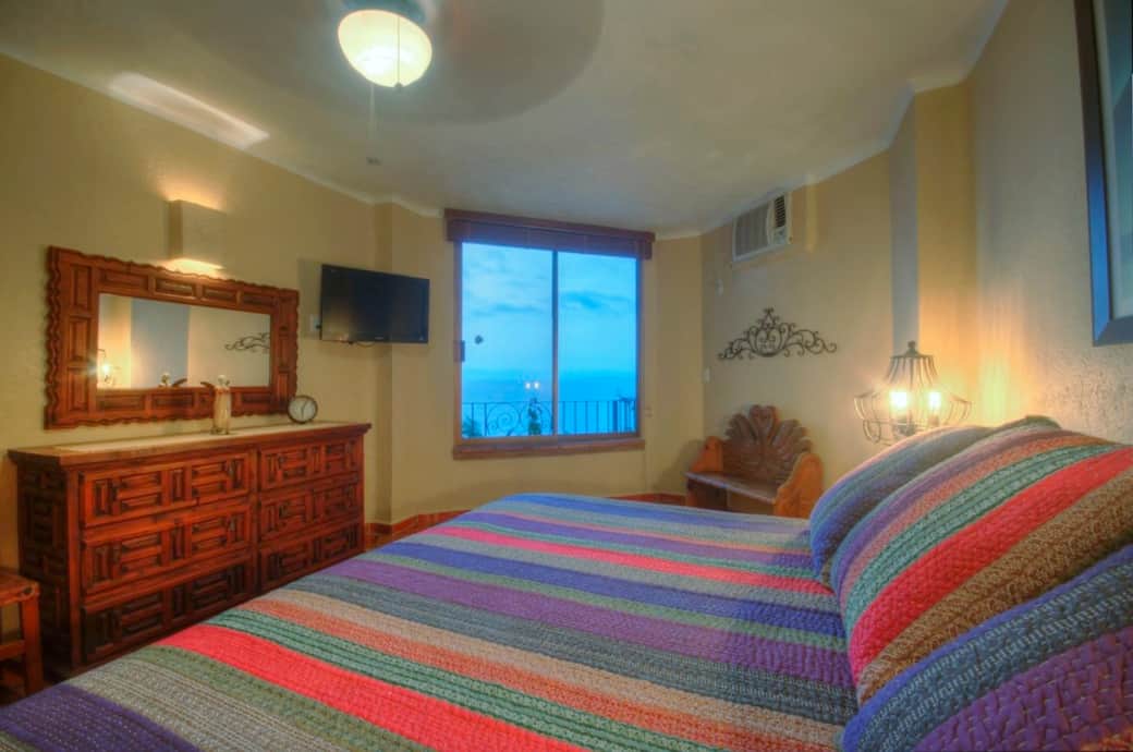 Wake up to ocean views from the primary bedroom