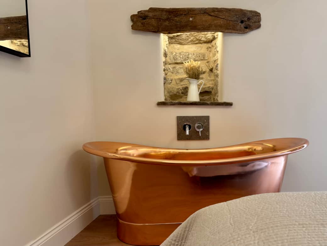 Master Bedroom with Copper Freestanding Bath