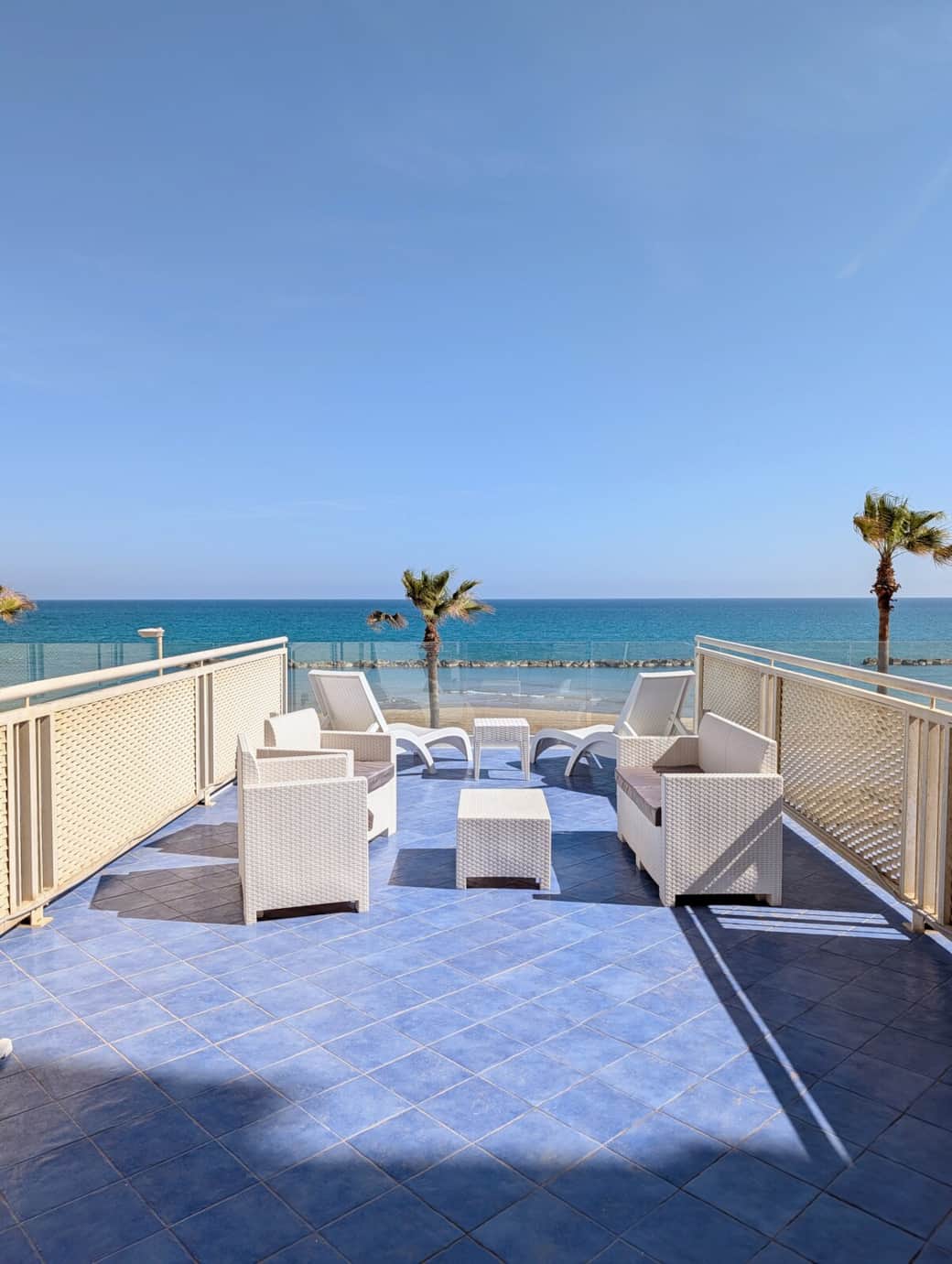 Sea-view terrace with lounge seating