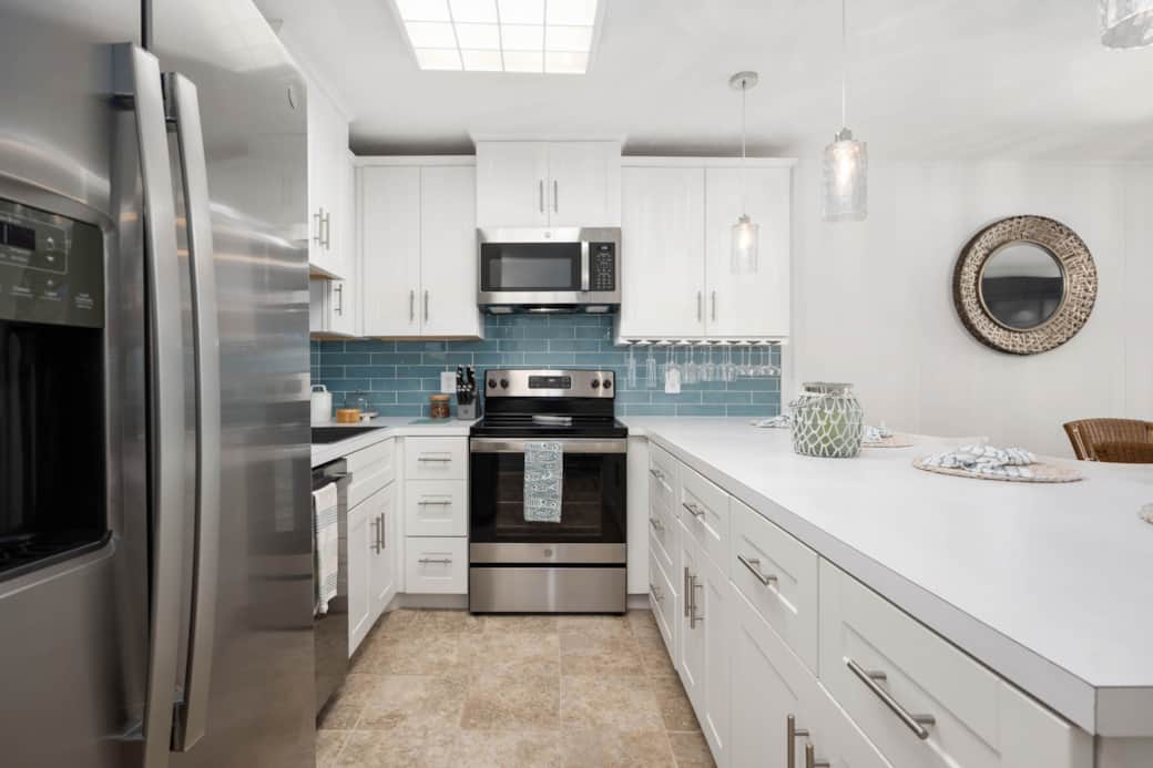 Updated appliances and all the kitchen utensils you need.