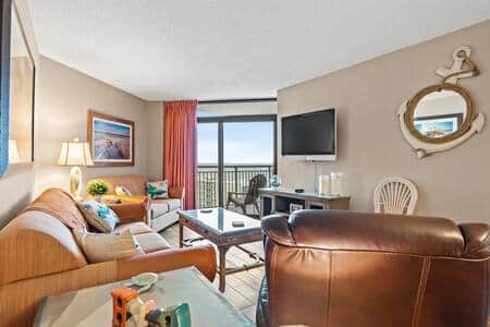 Living room with sleeper sofa and ocean views. Living room with sleeper sofa and ocean views.