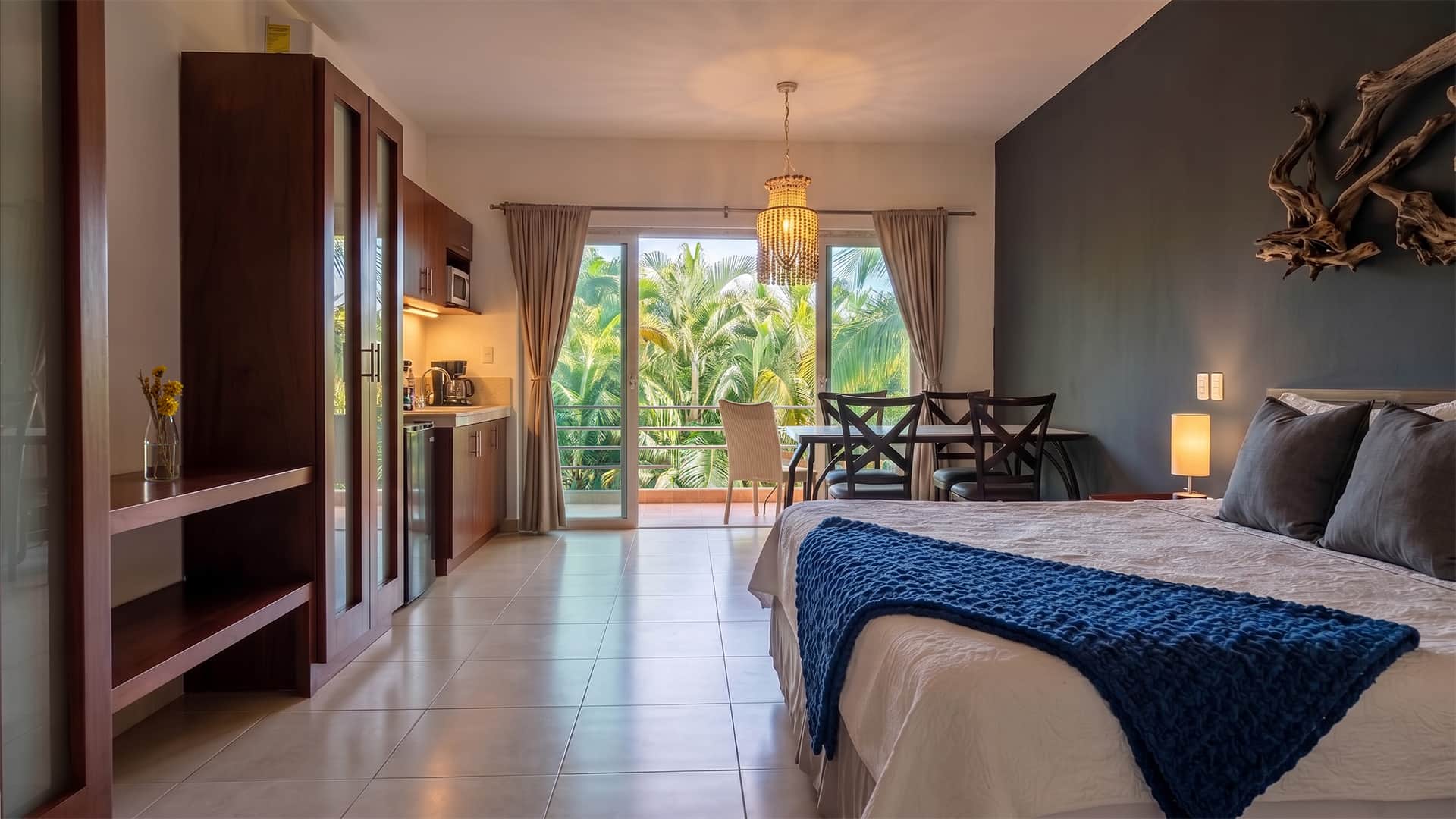 Living Space and King Sized Bed with Balcony View.jpg Living Space and King Sized Bed with Balcony View.jpg