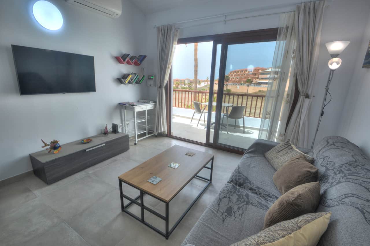 Sala de estar con sofá cama