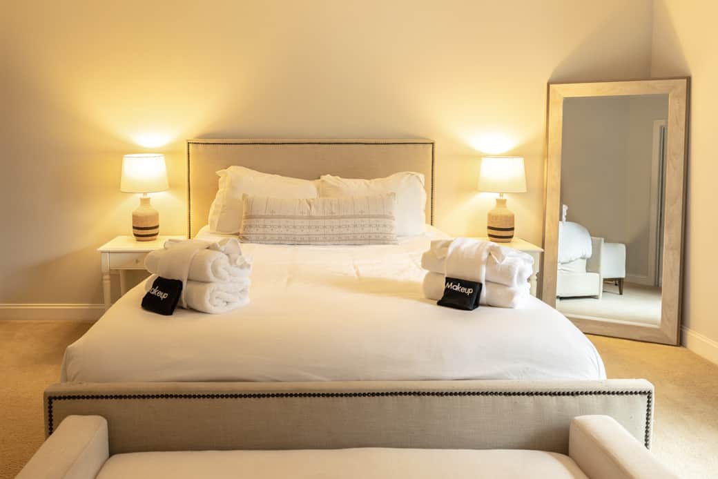 Primary bedroom has one queen bed