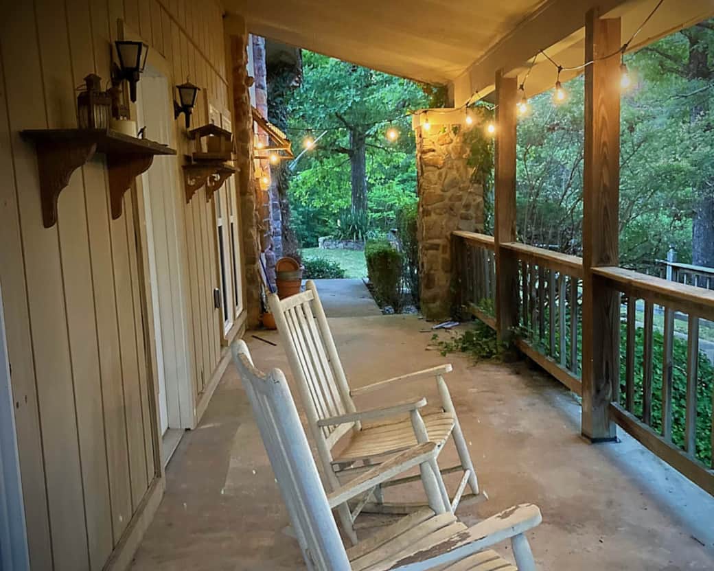 The rustic front porch at the Grotto is the perfect place to relax.