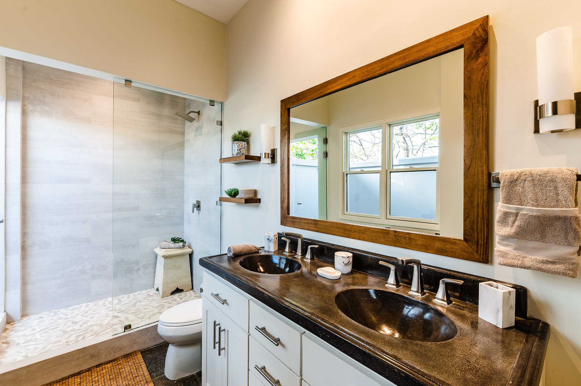 Indoor and outdoor shower and Mr. & Mrs. double sink vanity.