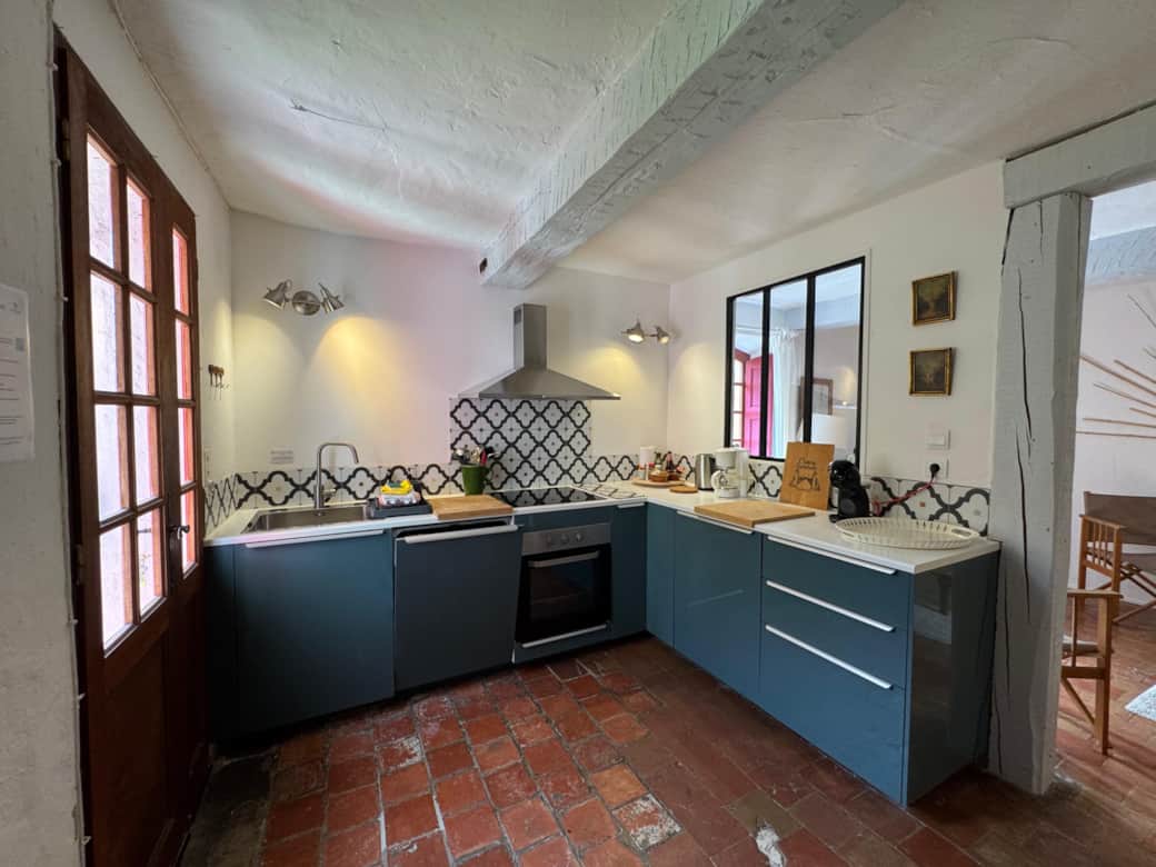kitchen, oven, fridge, coffee machine, kettle, sugar, tea, coffee, living room, chair
