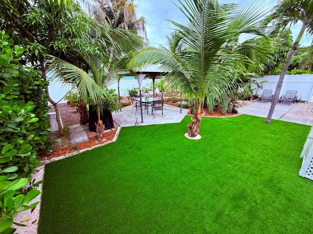 This comfortable and newly refurbished backyard space is perfect for social time or (our favorite) relaxing in the beautiful Florida sun!