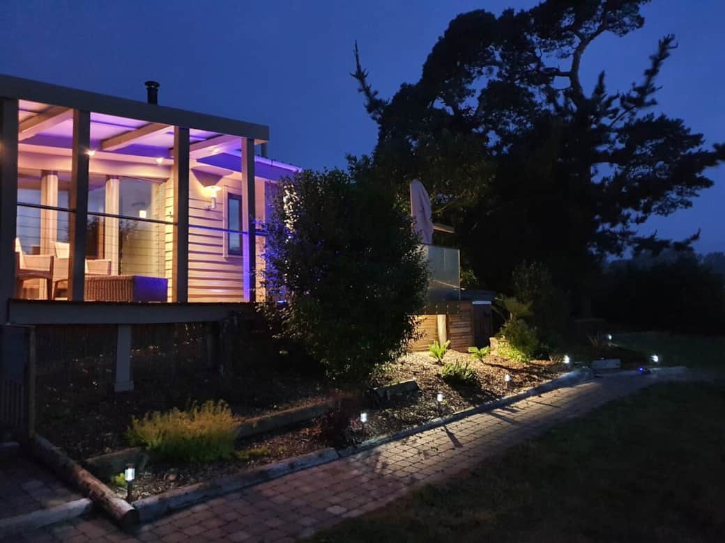 FRONT DECKING : Bedroom Balcony lit by night. FRONT DECKING : Bedroom Balcony lit by night.