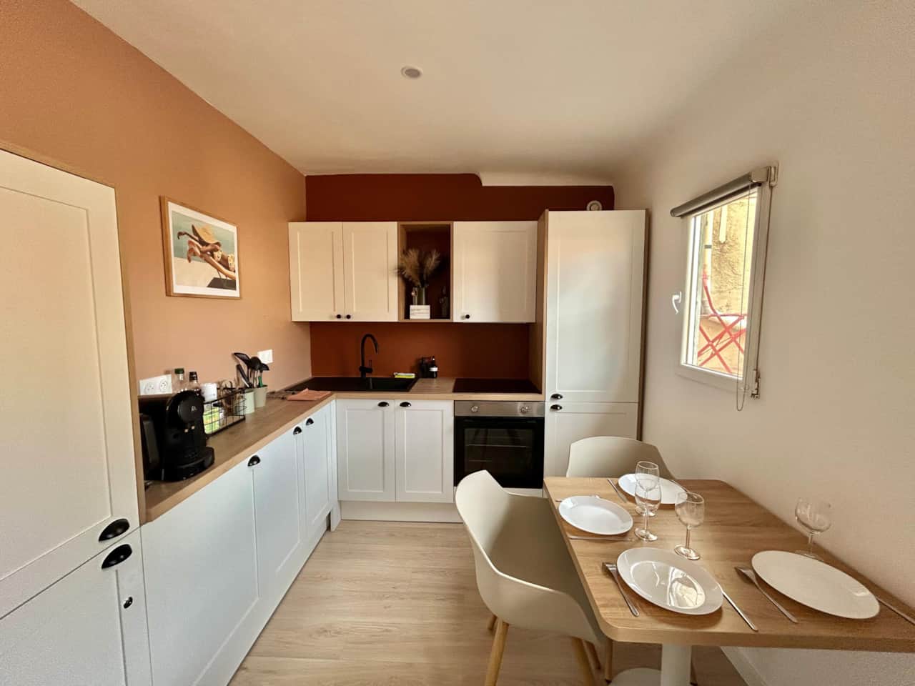 kitchen, oven, coffee machine, dining table