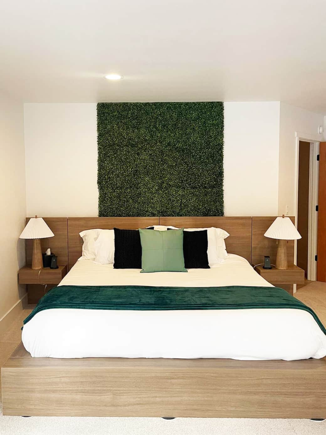 A luxurious King bed and minimalist design in the Master Bedroom