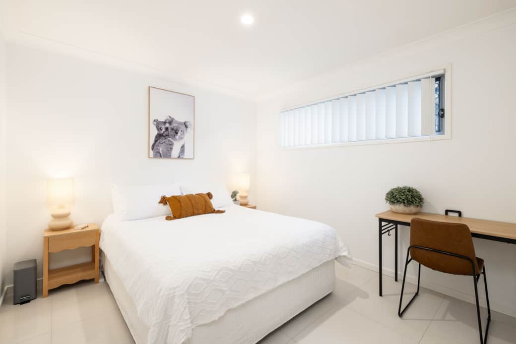 Bedroom 1: Peaceful bedroom with cozy design and ample storage