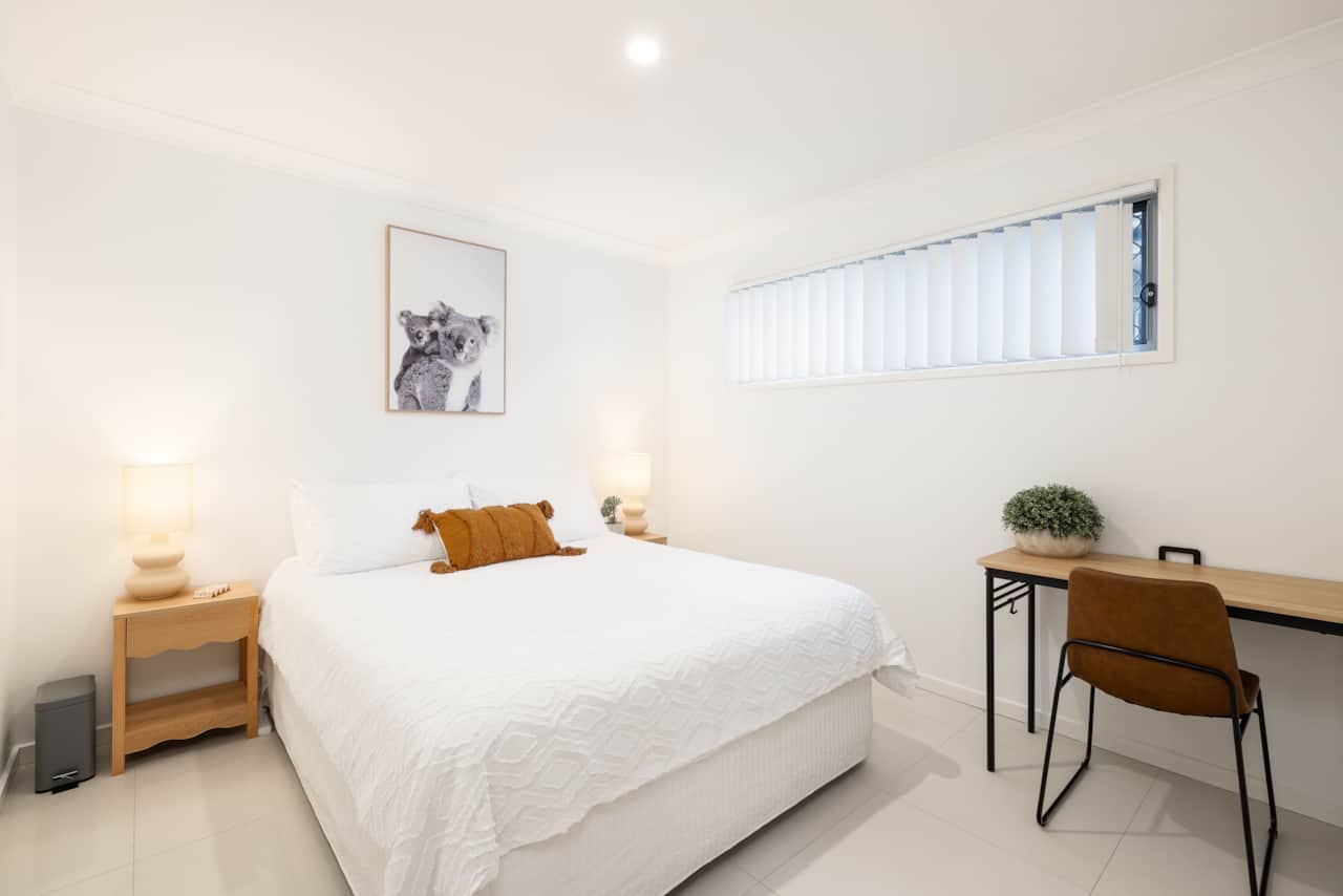 Bedroom 1: Peaceful bedroom with cozy design and ample storage