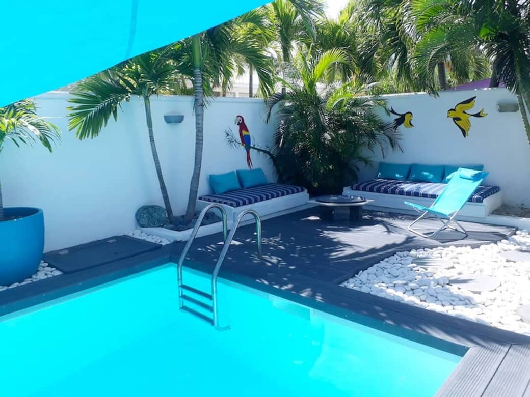 Swimming pool with small outdoor seating area Magnolia