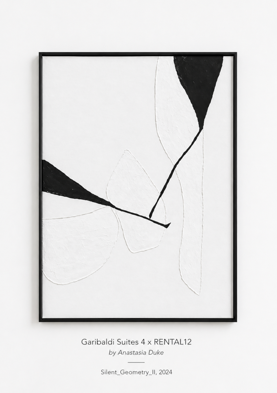 Silent Geometry II — single framed panel on white wall at Garibaldi Suites #4 in Olbia