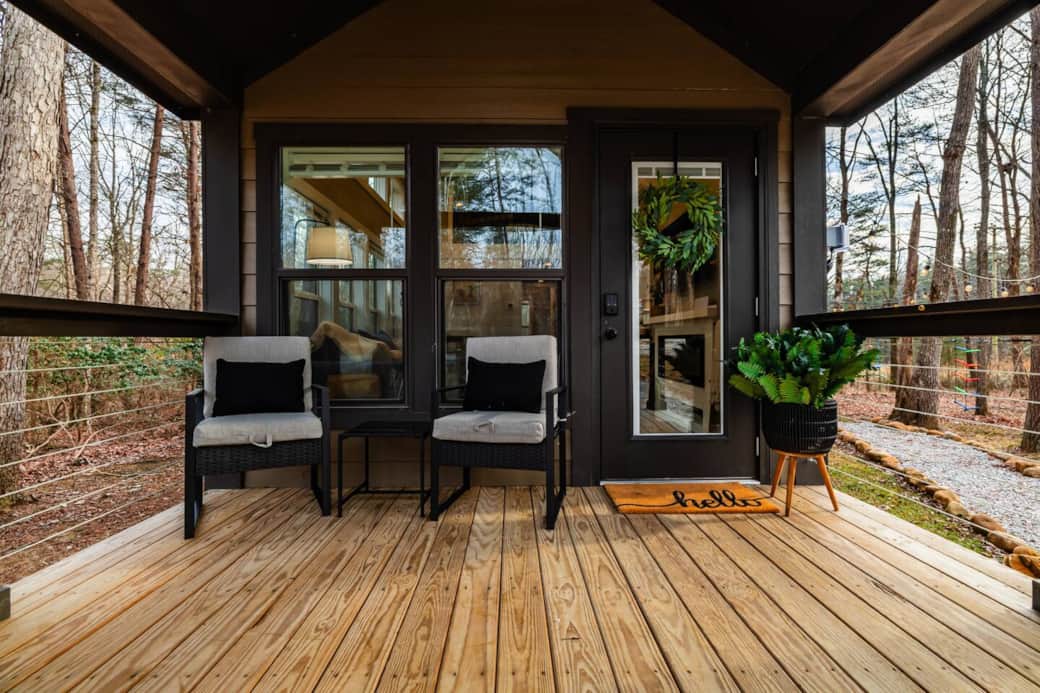 Spacious front porch to enjoy the views of nature, deer, and birds. 