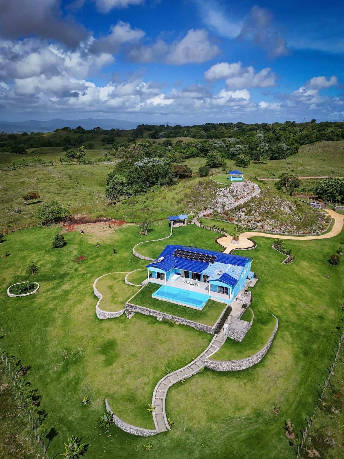 The Blue House pool and gardens seen from above