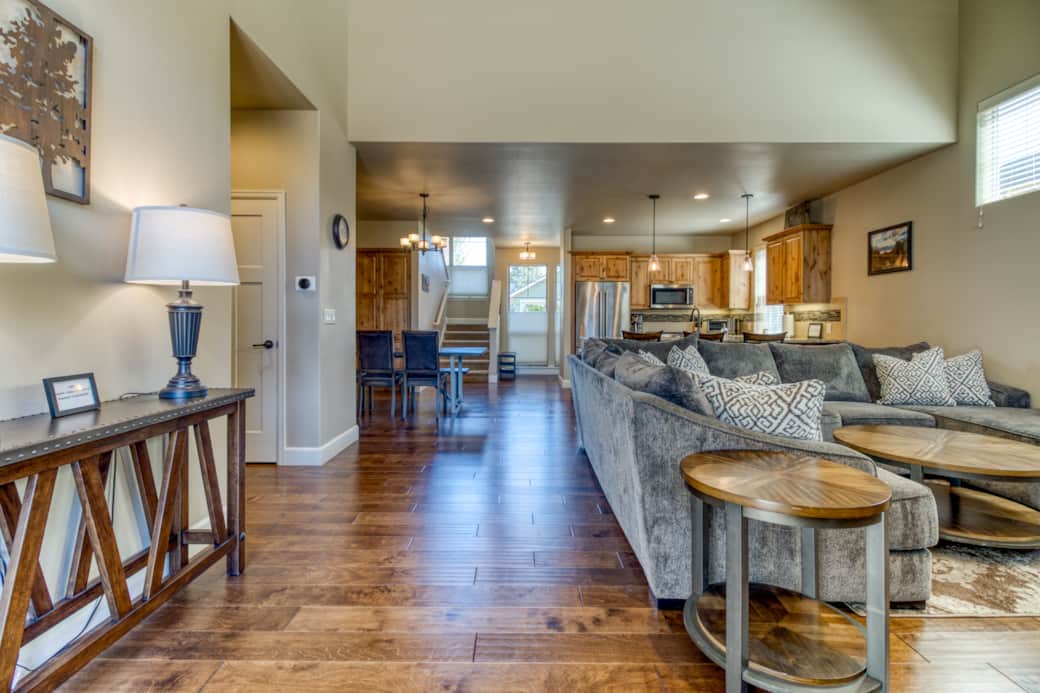 Open-concept main floor showing great room, dining, and kitchen flow