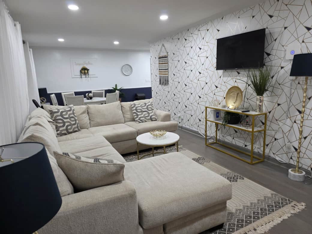 Cozy open concept living room and dining room at Braves Battery Central Smyrna, Ga