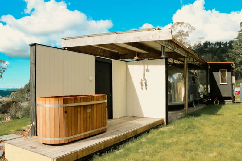 The hot tub and outdoor shower are shielded for privacy