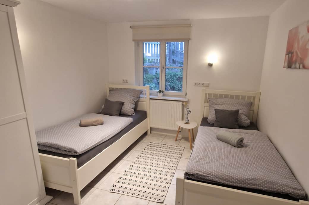 Gemütliches Schlafzimmer mit zwei Einzelbetten Gemütliches Schlafzimmer mit zwei Einzelbetten