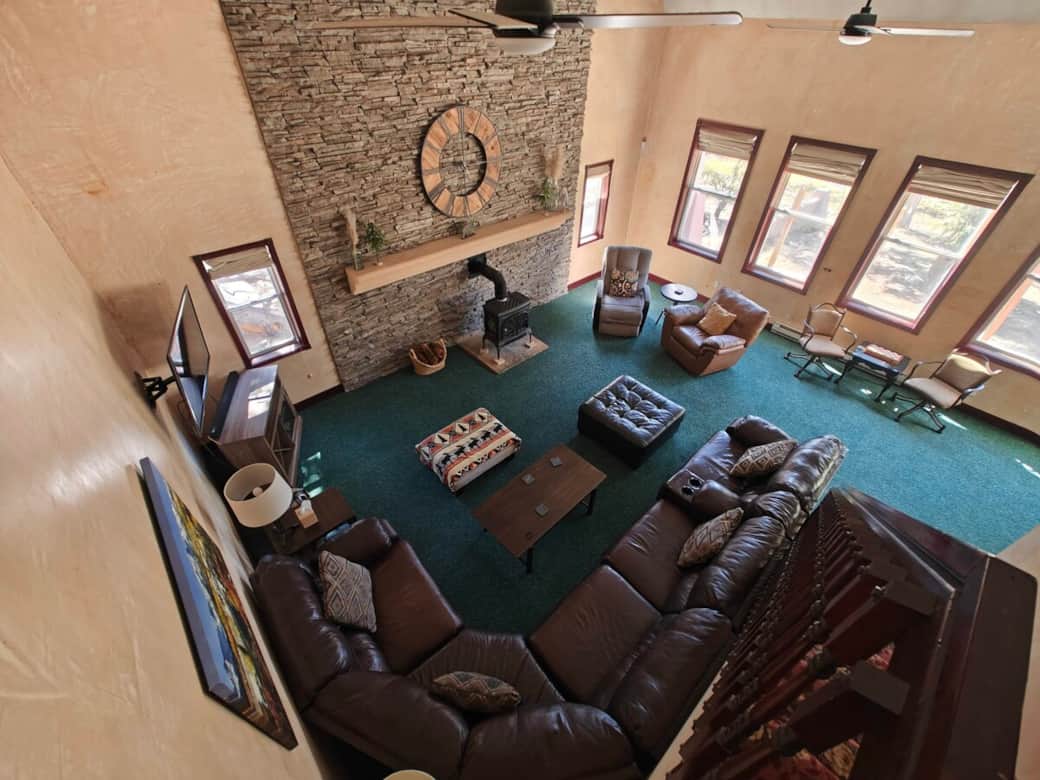 High ceilings over the spacious great room make for an open and cozy feel for your large family get-togethers. High ceilings over the spacious great room make for an open and cozy feel for your large family get-togethers.