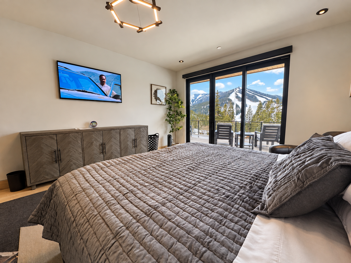 Another view of the primary king bedroom and deck access.