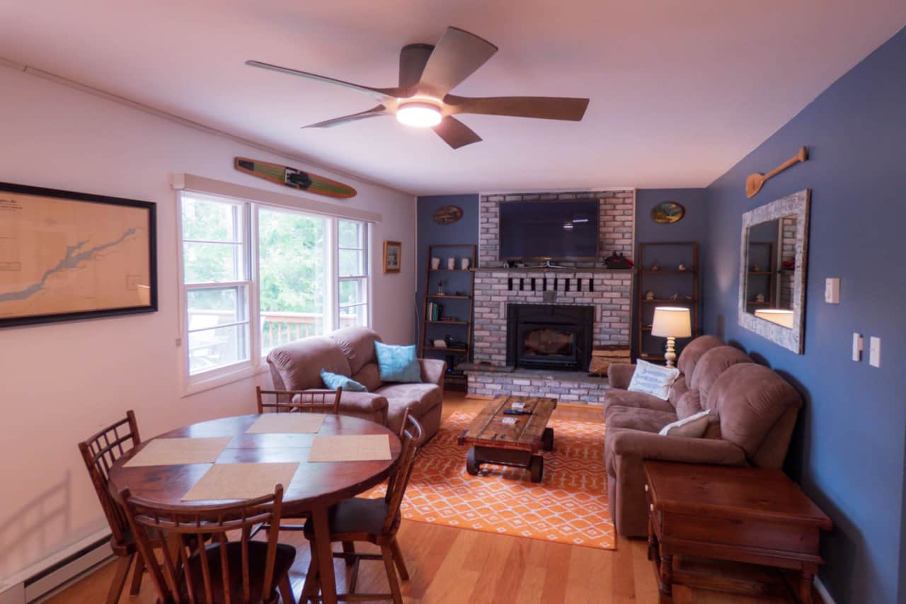 Open concept living and dining area. Wood burning stove for those cold winter nights.