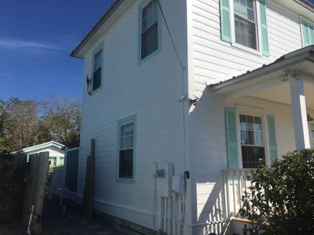 North view of house - gate to back yard and to bungalow
