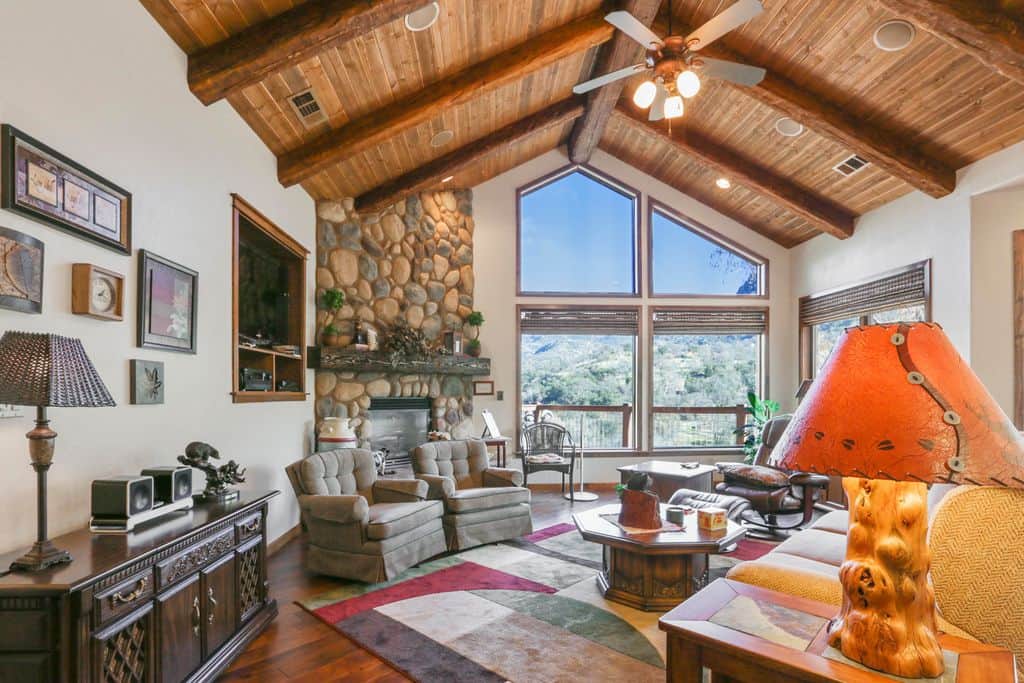 Living Room Fireplace with  Remote Shades
