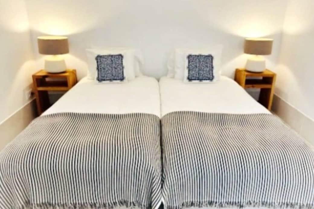 Two beds, each 200 x 90 cm