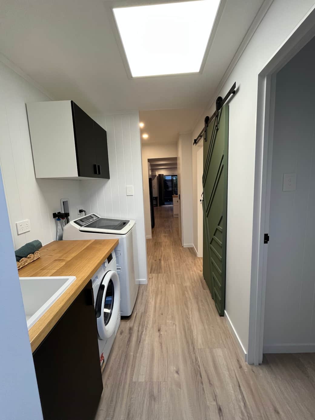Laundry Passage and Bathroom Barn Door