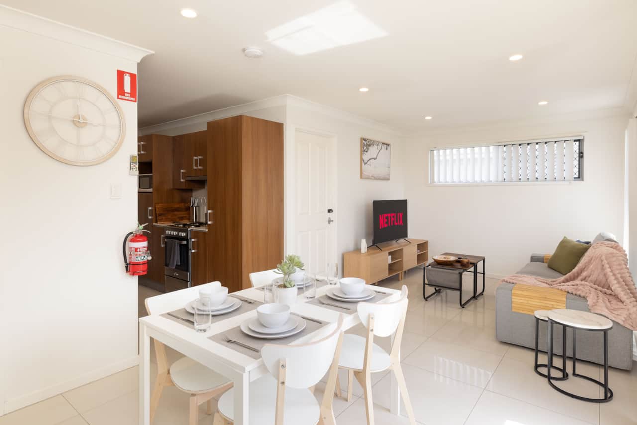 Dining Area: Integrated dining area within open living layout