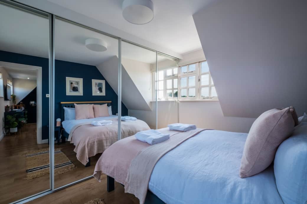 The bedroom.
French linen bedding, nectar sleep mattress.
Views over Rye.