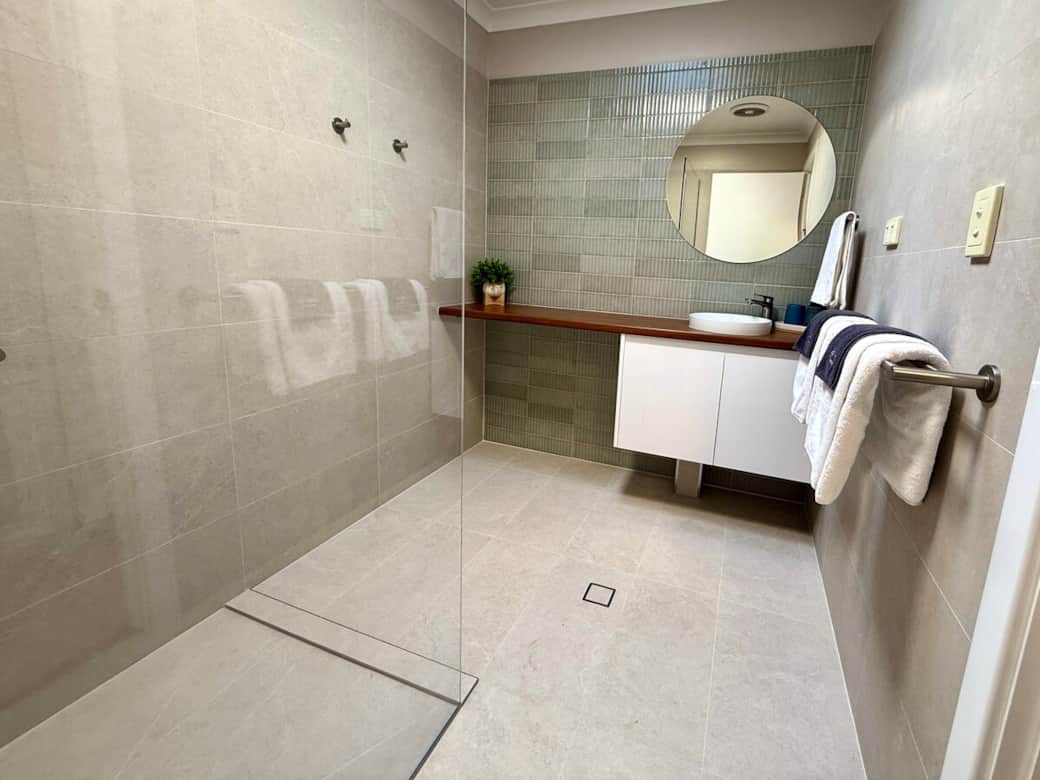 Newly renovated bathroom with large walk in shower.