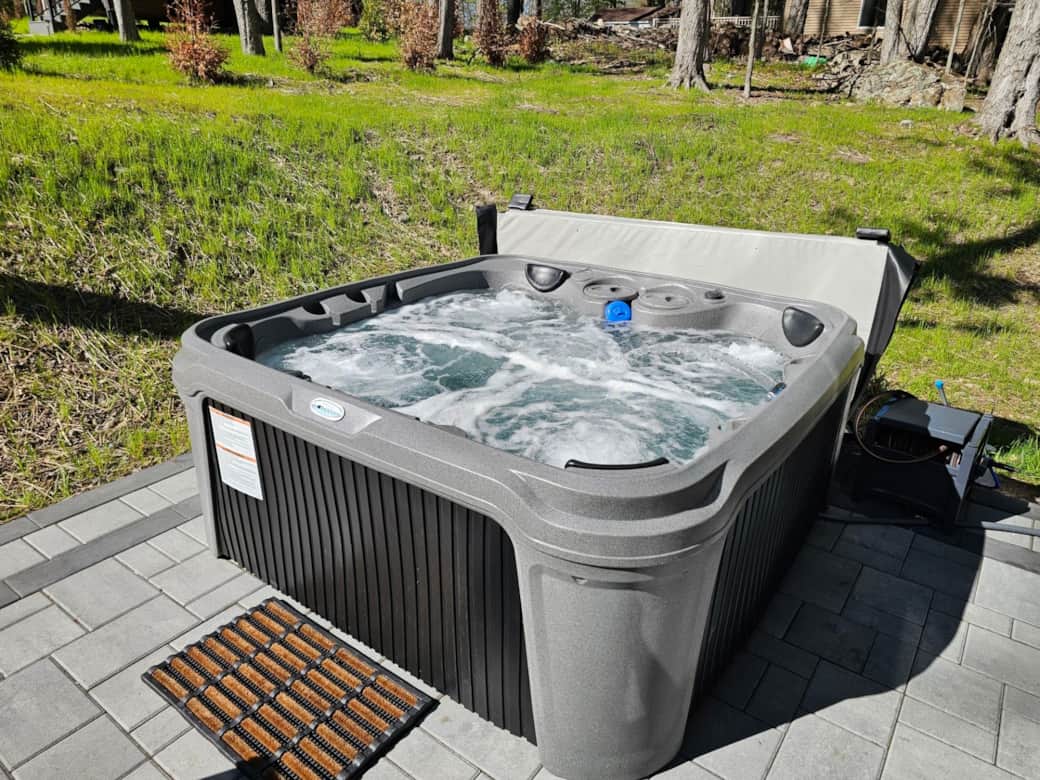 Enjoy a relaxing time in the hot tub. Up to six people will fit comfortably Enjoy a relaxing time in the hot tub. Up to six people will fit comfortably