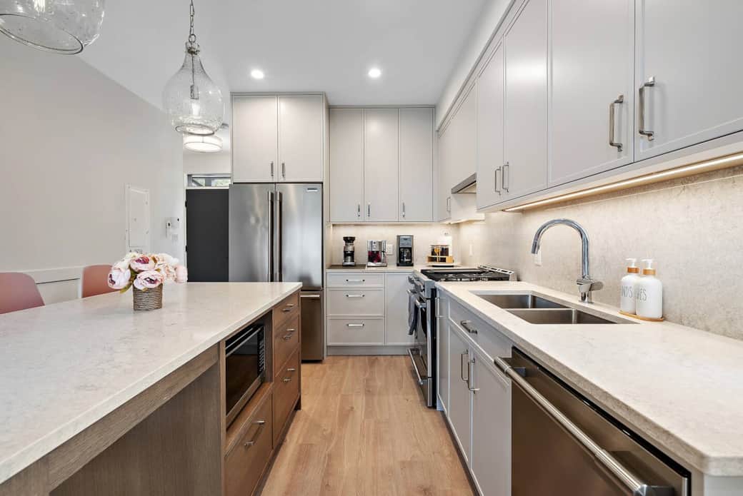 Chef’s kitchen with stainless steel appliances: gas range and oven, fridge, dishwasher, and microwave. Breville espresso machine and grinder and Cuisinart drip coffee maker. The best-equipped Airbnb ever? Maybe so.