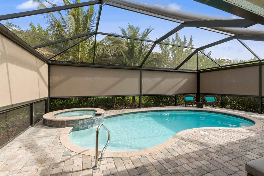 Electric privacy screens allow for full relaxation in our back pool area