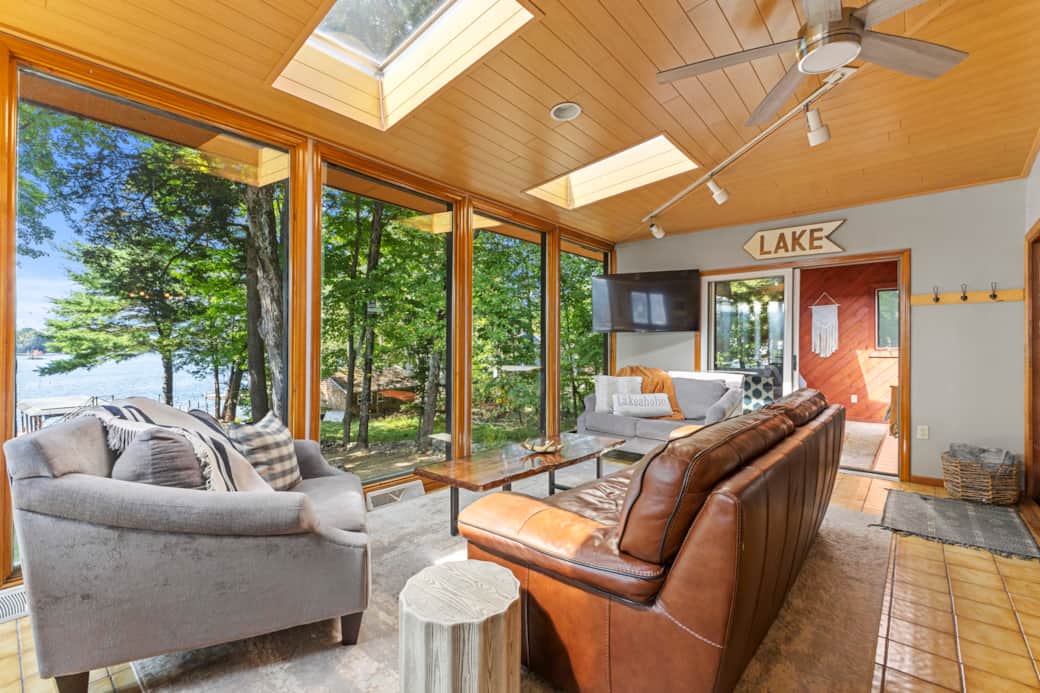 Sunroom with floor to ceiling windows