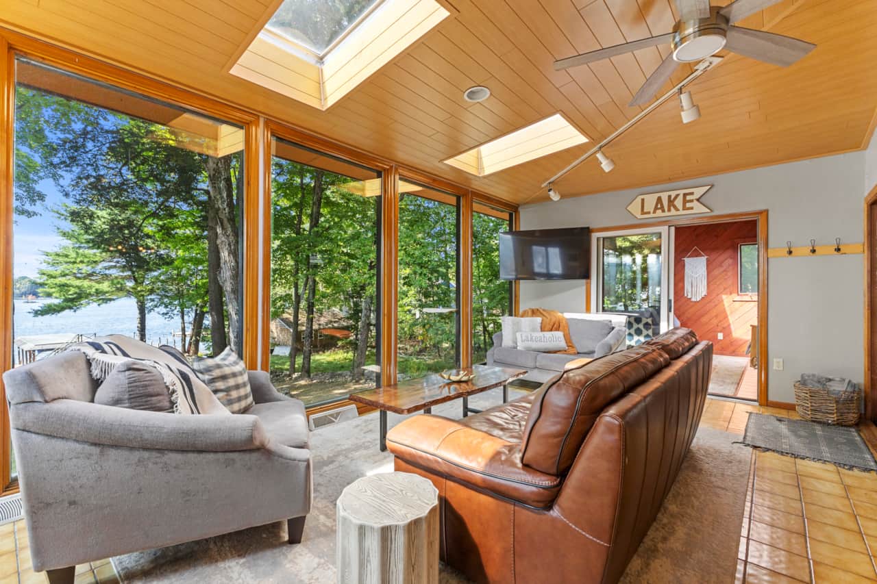 Sunroom with floor to ceiling windows