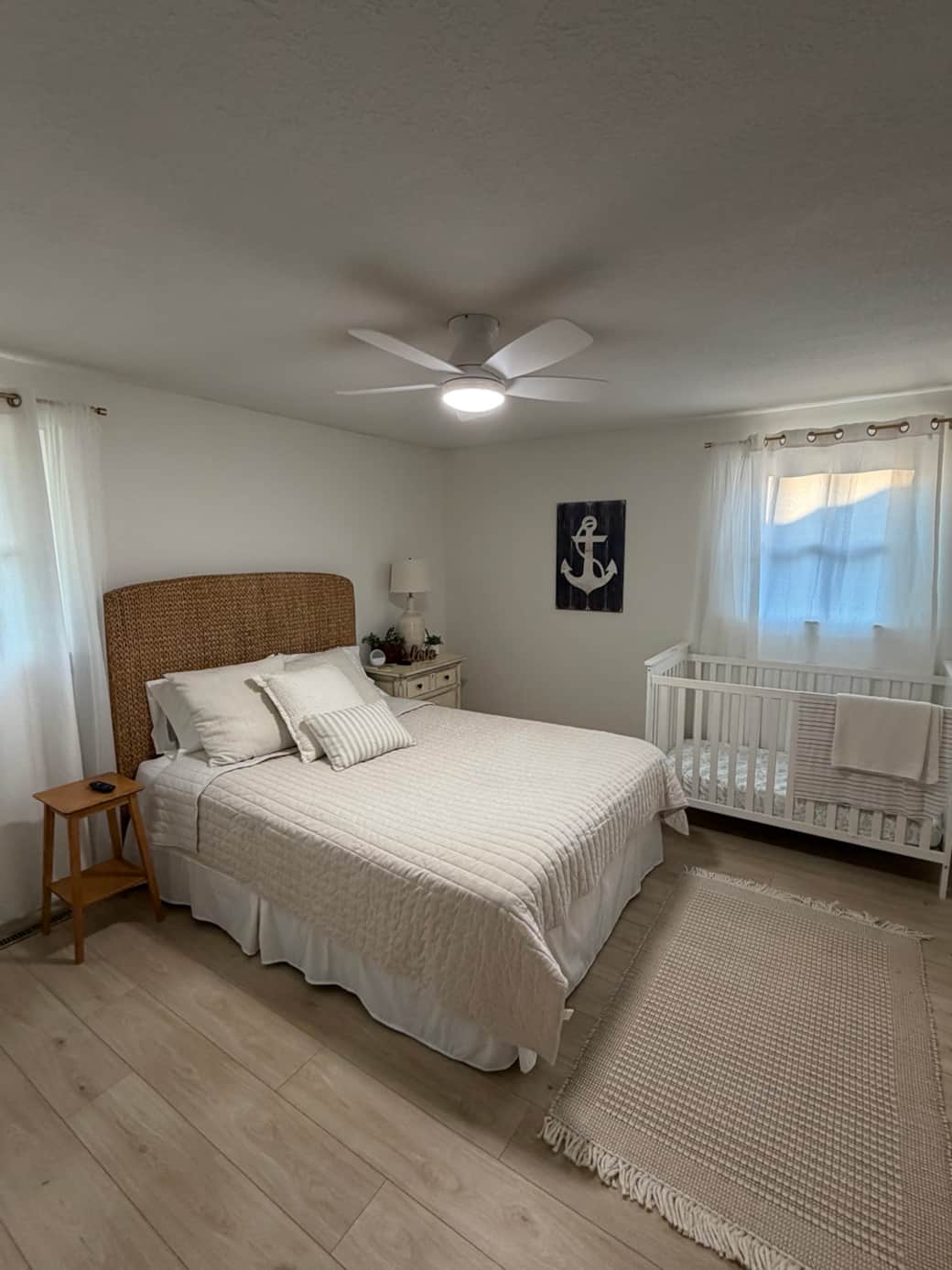 First floor bedroom with queen bed and full sized crib. Roku TV in this room as well.