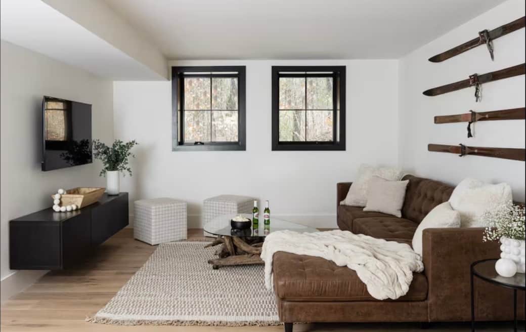 Secondary living room with games, foosball, sonos, and smart TV.