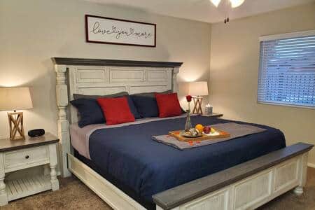 Master bedroom with a king sized bed!